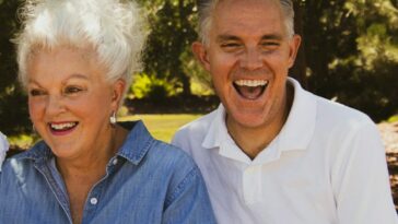 man wearing white polo shirt