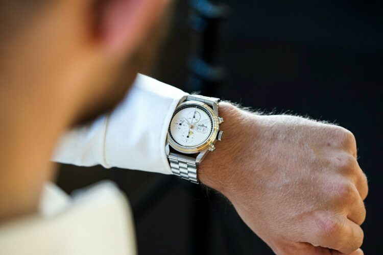 a close up of a person wearing a watch