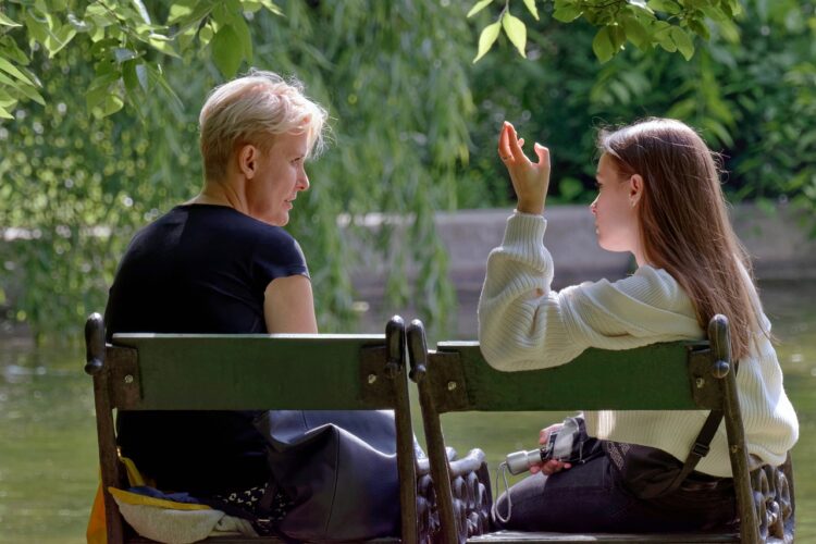 people, woman, mother, daughter, sitting, talking, nature, bench, park, lake, trees, relaxation