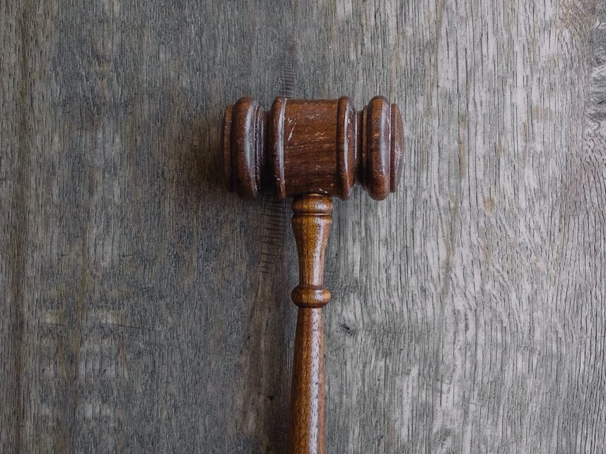 brown mallet on gray wooden surface