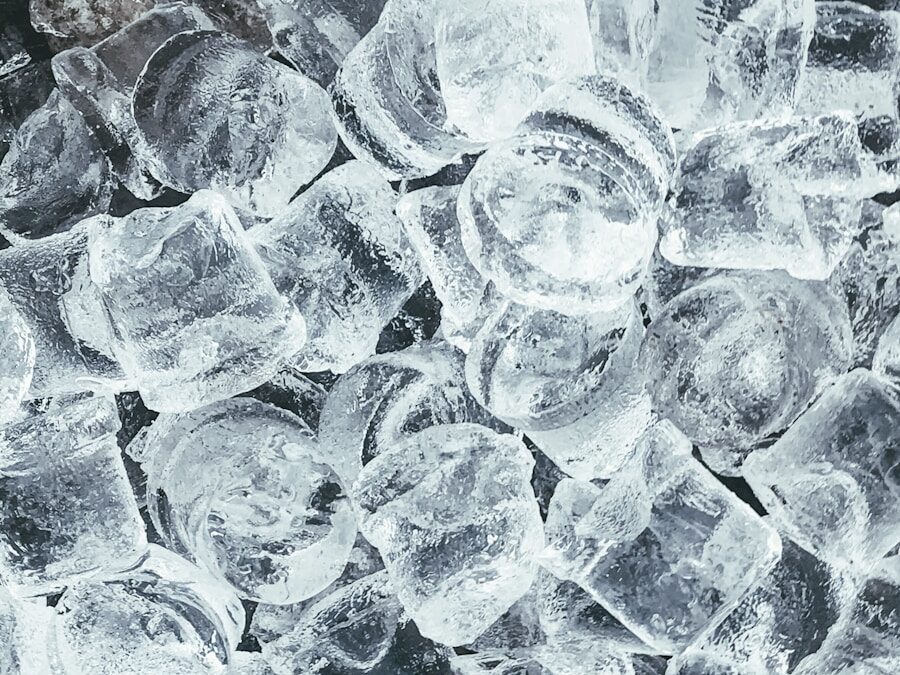 clear glass round ornament on gray stone