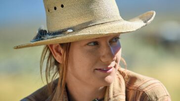 woman in beige hat