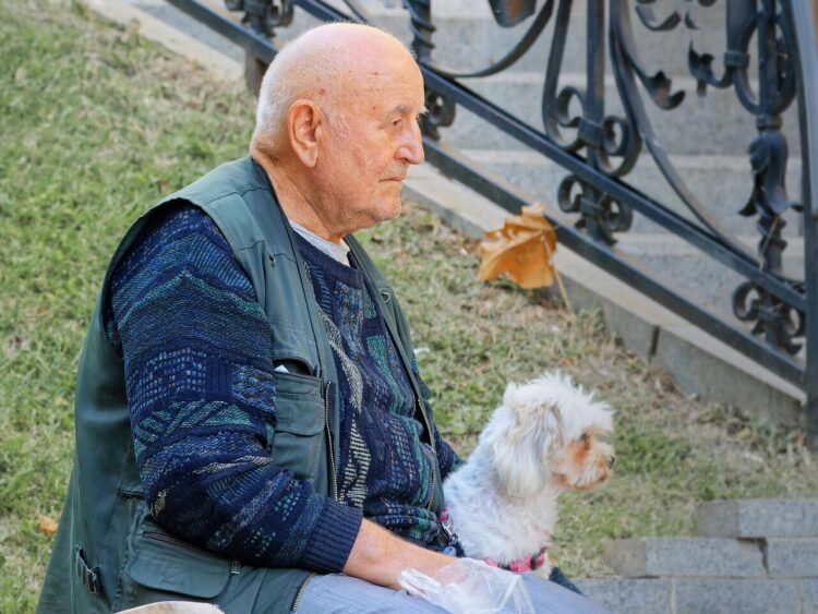 man, elderly, nature, old man, sad, pet, dog, animal, canine, outdoors, sitting, bench, park, relaxation, lifestyle