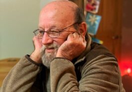 man resting his head on the table