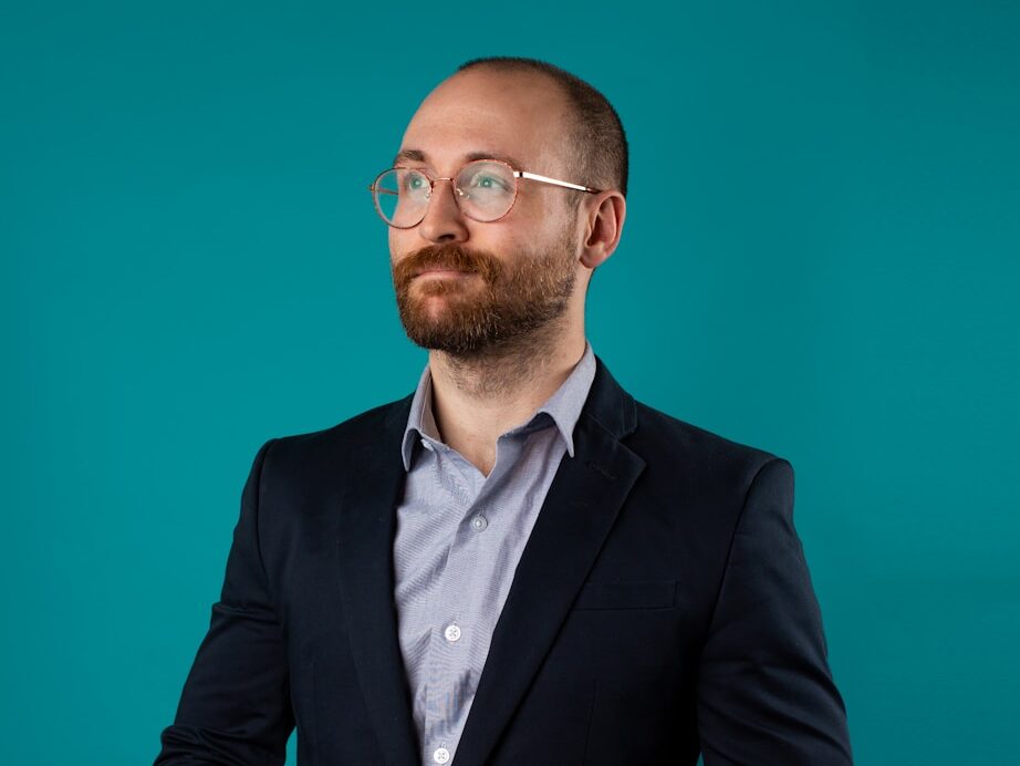 man wearing black suit