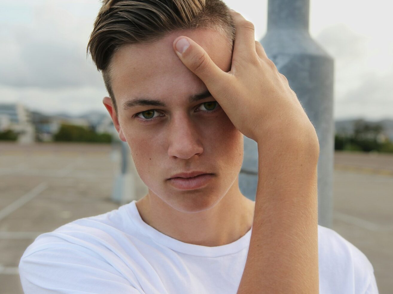 men's white crew-neck top close-up photography