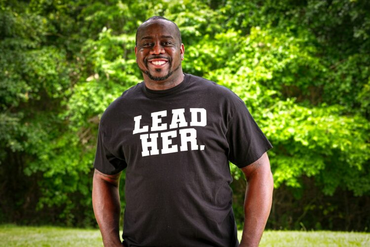 a man smiling for the camera