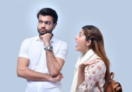 a man and woman looking at each other