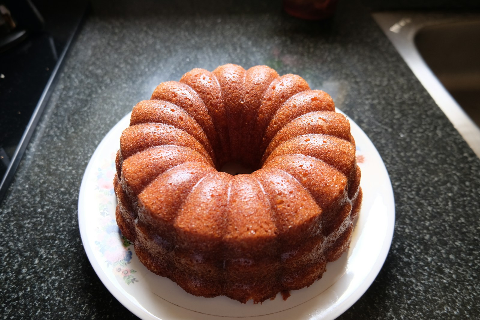 a bundt cake sitting on top of a white plate