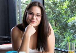 portrait of woman wearing white tank top