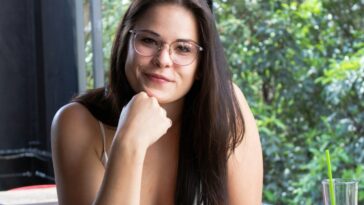 portrait of woman wearing white tank top