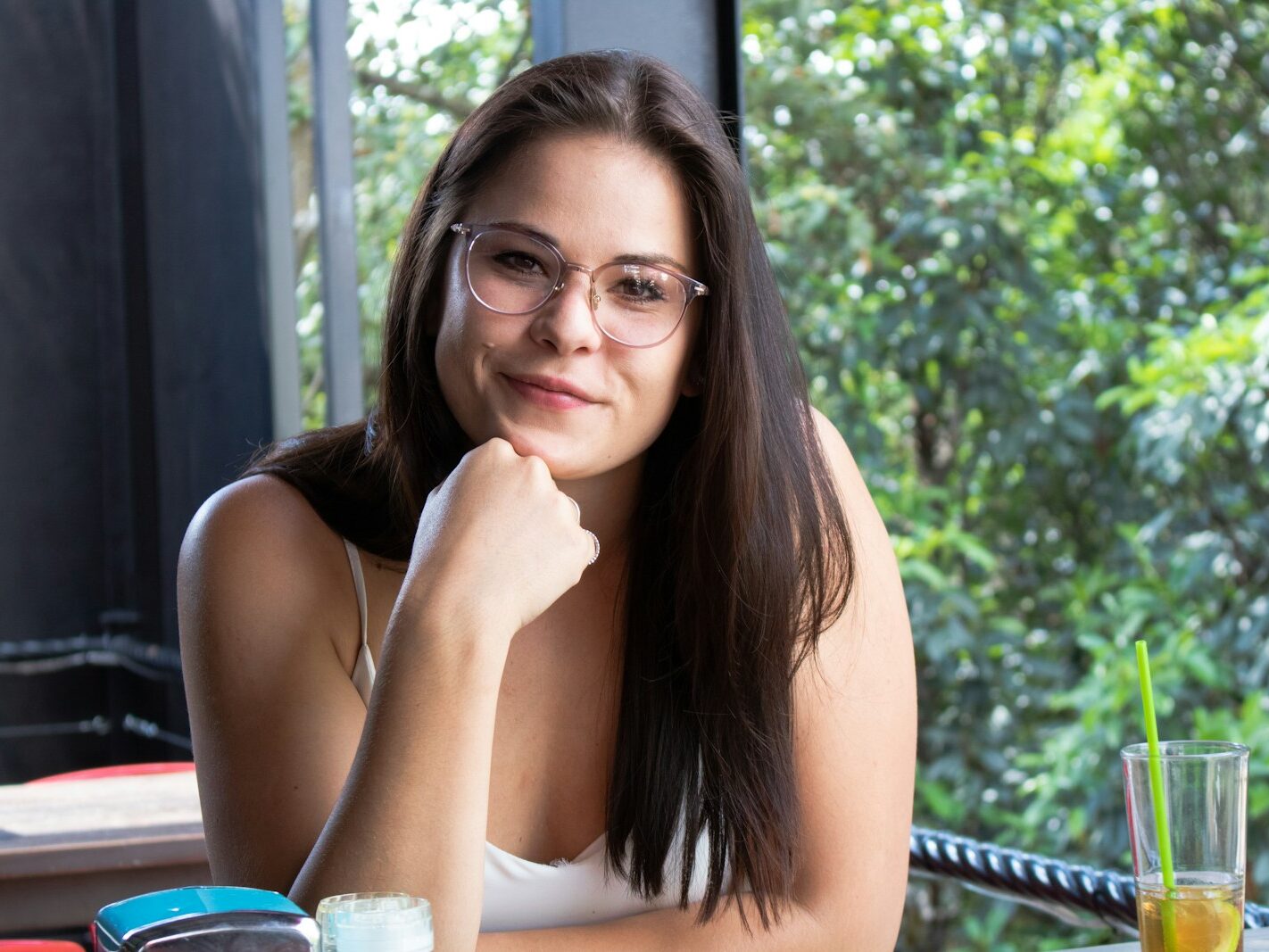 portrait of woman wearing white tank top