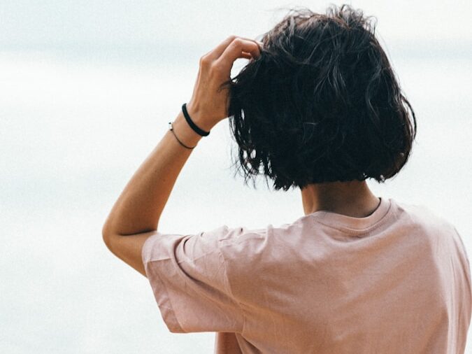woman in white crew neck t-shirt