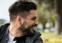 man in black leather jacket