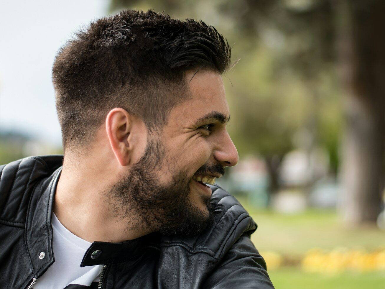 man in black leather jacket