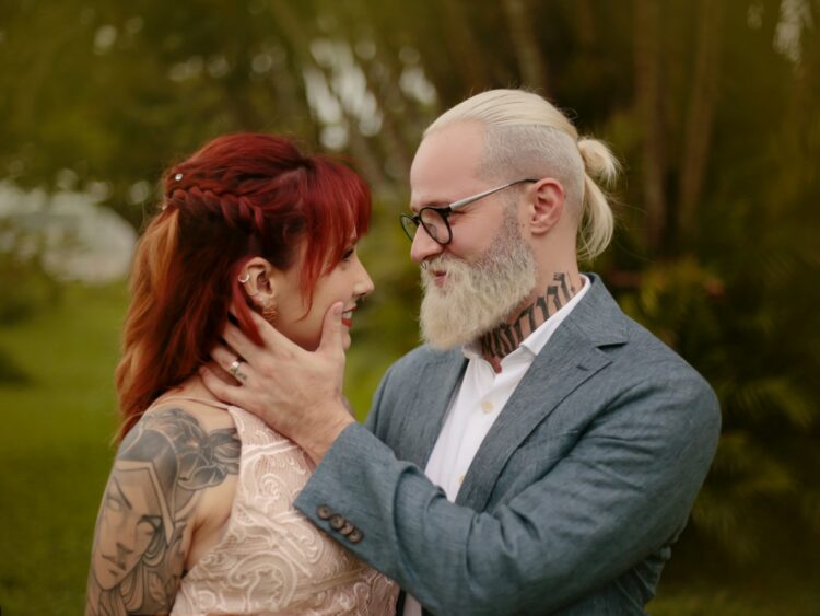 a man and woman kissing