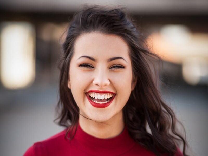 closeup photography of woman smiling