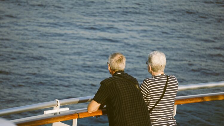 A couple of people that are on a boat