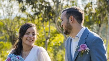 a man and a woman standing next to each other