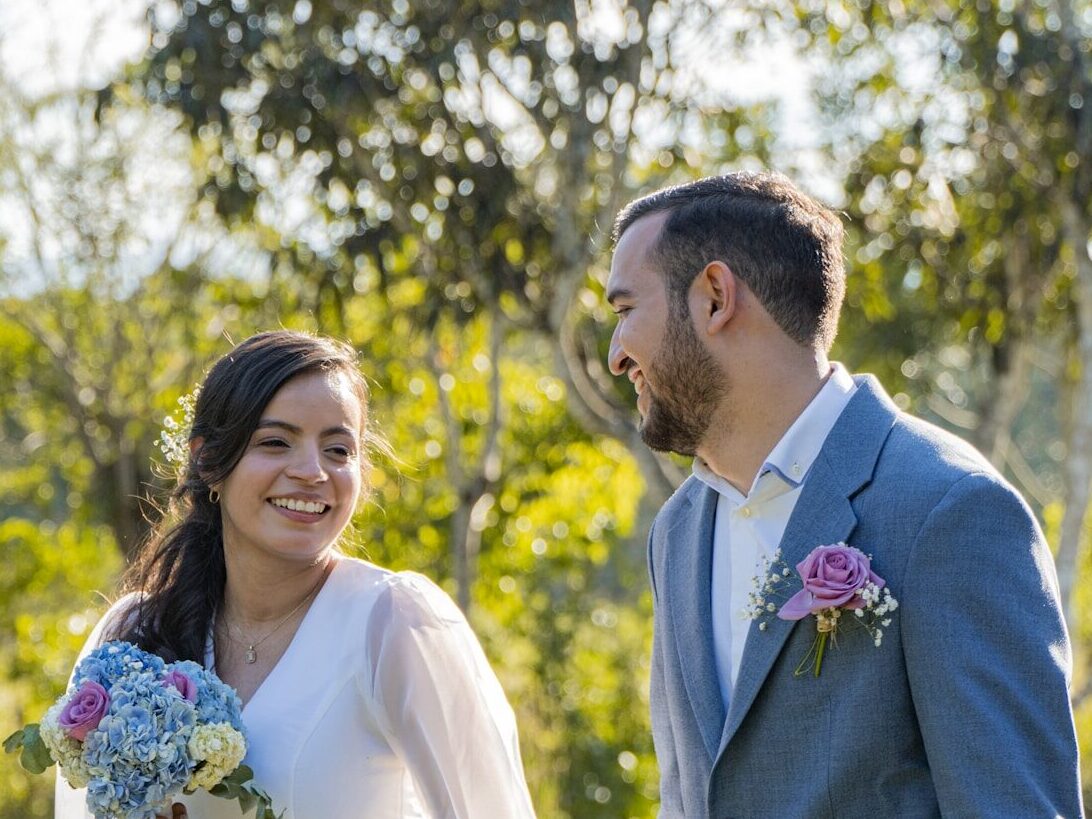 a man and a woman standing next to each other