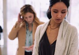 woman using white device