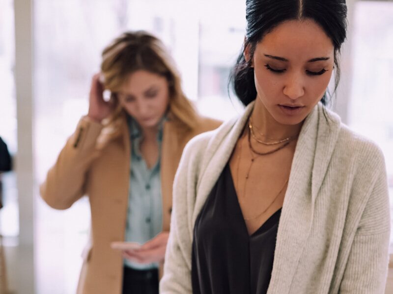 woman using white device