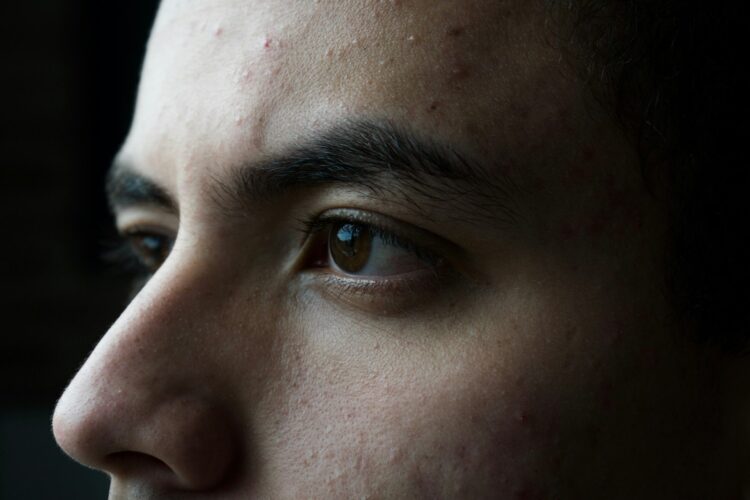 a close up of a man's face