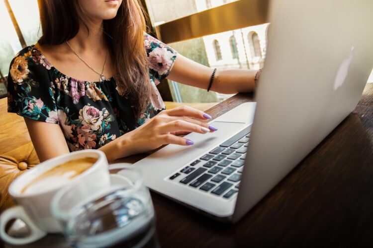 woman, laptop, desk, coffee cup, workspace, macbook, technology, work, working, working woman, coffee, computer, cup, girl, mug