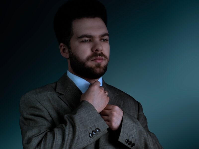 man in gray suit jacket