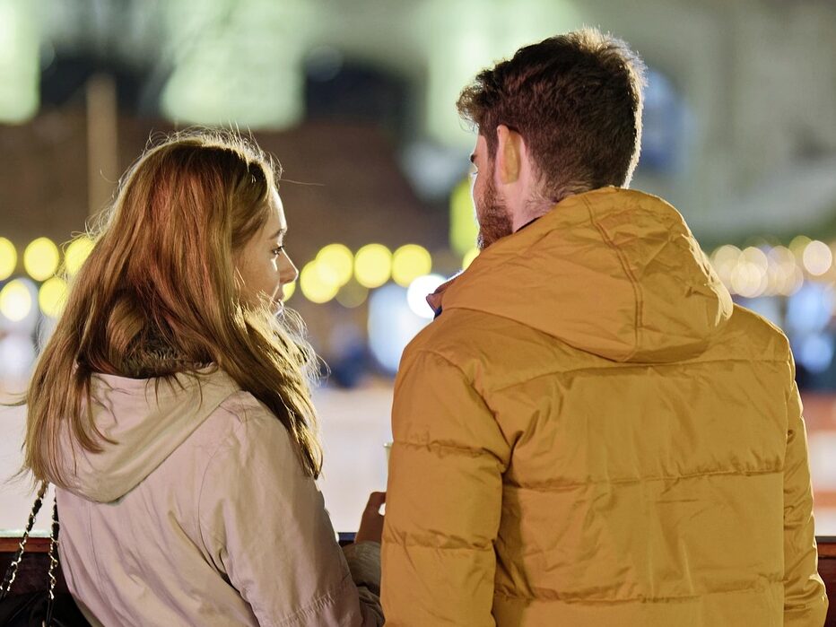 merry christmas, couple, young people, people, blonde, friendship, together, talking, fence, winter, holiday, lights, ornaments, decoration, back view, snapshot
