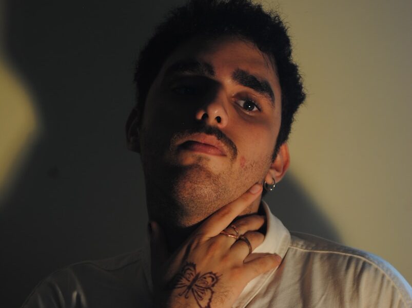a man with his hand on his chin