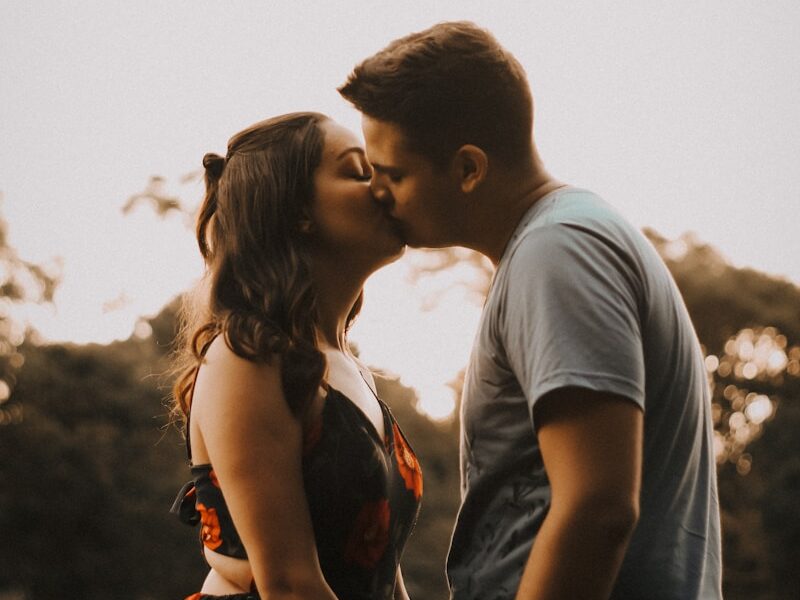 couple kissing during daytime
