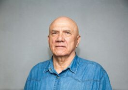 a man in a blue shirt