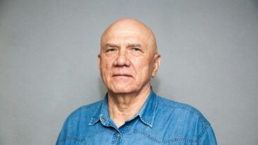 a man in a blue shirt