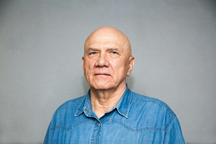 a man in a blue shirt