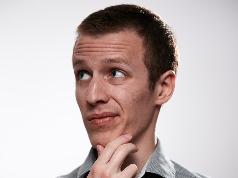 man in gray button up shirt