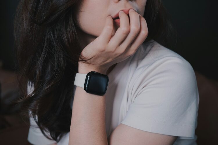 a woman with a watch on her wrist