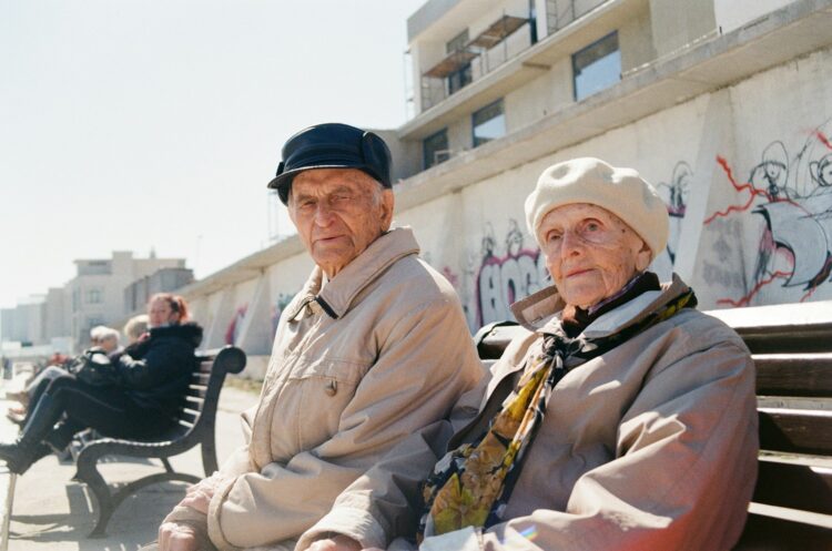 a man sitting on a bench