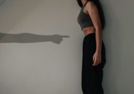 woman in black tank top and black pants