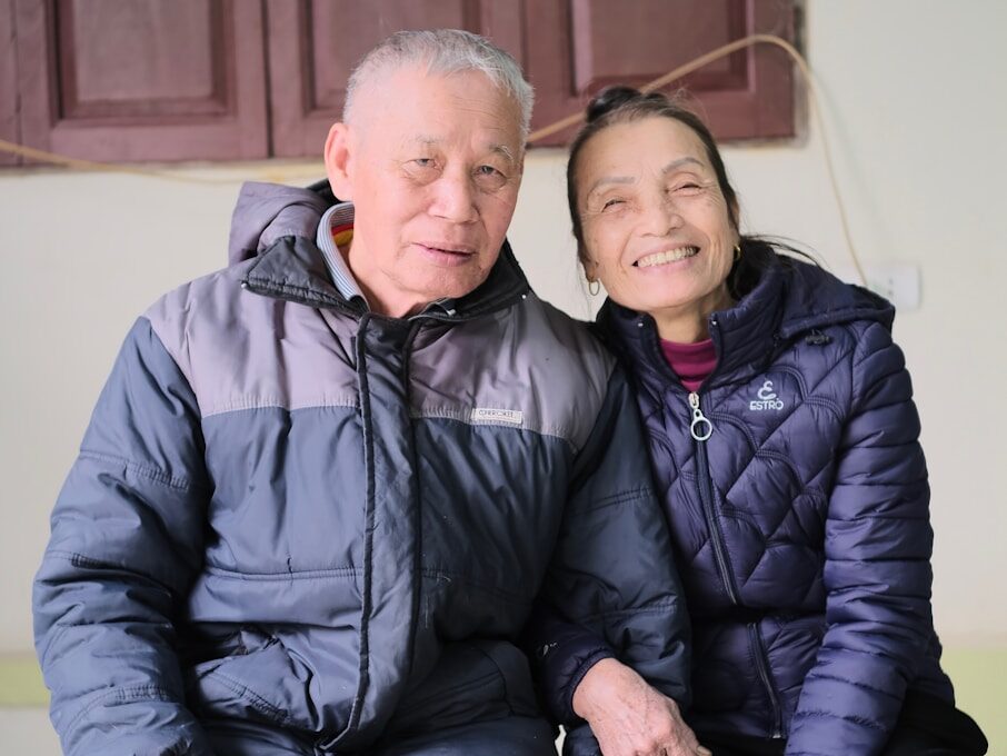 A man and a woman sitting next to each other