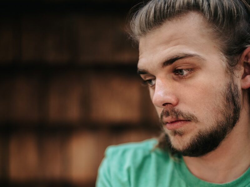 man in green crew neck t-shirt