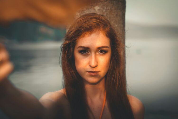 woman in black tank top