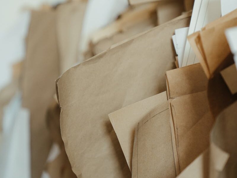 Detailed close-up of stacked craft and parchment papers, perfect for DIY and handmade projects.