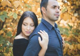 a man and a woman standing next to each other