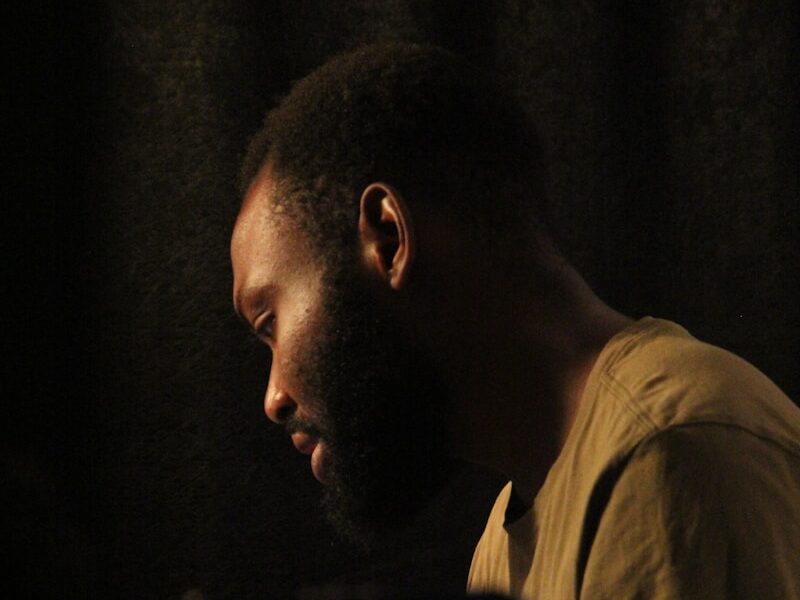 A man is focused on something out of view.
