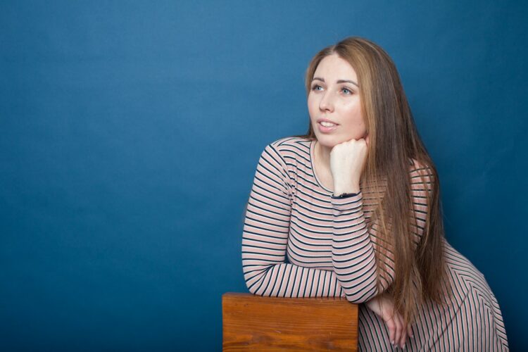 a woman standing at a podium