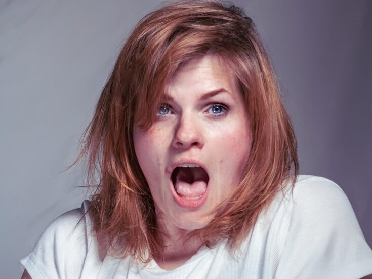 A woman with a surprised look on her face