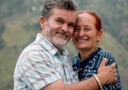 a man and a woman hugging each other