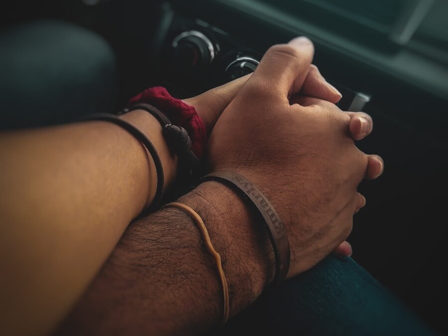 people holding hands together