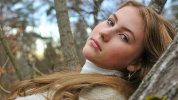 a woman with a fur coat